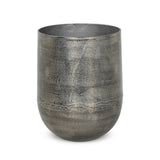 Futuristic-like metal with an antiqued finish, shaped into a cast planter with textural movement that catches the light. Safe for any space, indoor or out. Cover or store indoors during inclement weather and when not in use.As enthusiasts of natural style at Amethyst, we love the designer inspired Zavia Metal Planter - Raw Antique Nickel. Amethyst Home provides interior design, new home construction design consulting, vintage area rugs, and lighting in the Kansas City metro area.