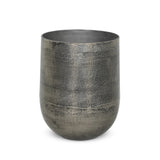 Futuristic-like metal with an antiqued finish, shaped into a cast planter with textural movement that catches the light. Safe for any space, indoor or out. Cover or store indoors during inclement weather and when not in use.As enthusiasts of natural style at Amethyst, we love the designer inspired Zavia Metal Planter - Raw Antique Nickel. Amethyst Home provides interior design, new home construction design consulting, vintage area rugs, and lighting in the Winter Garden metro area.