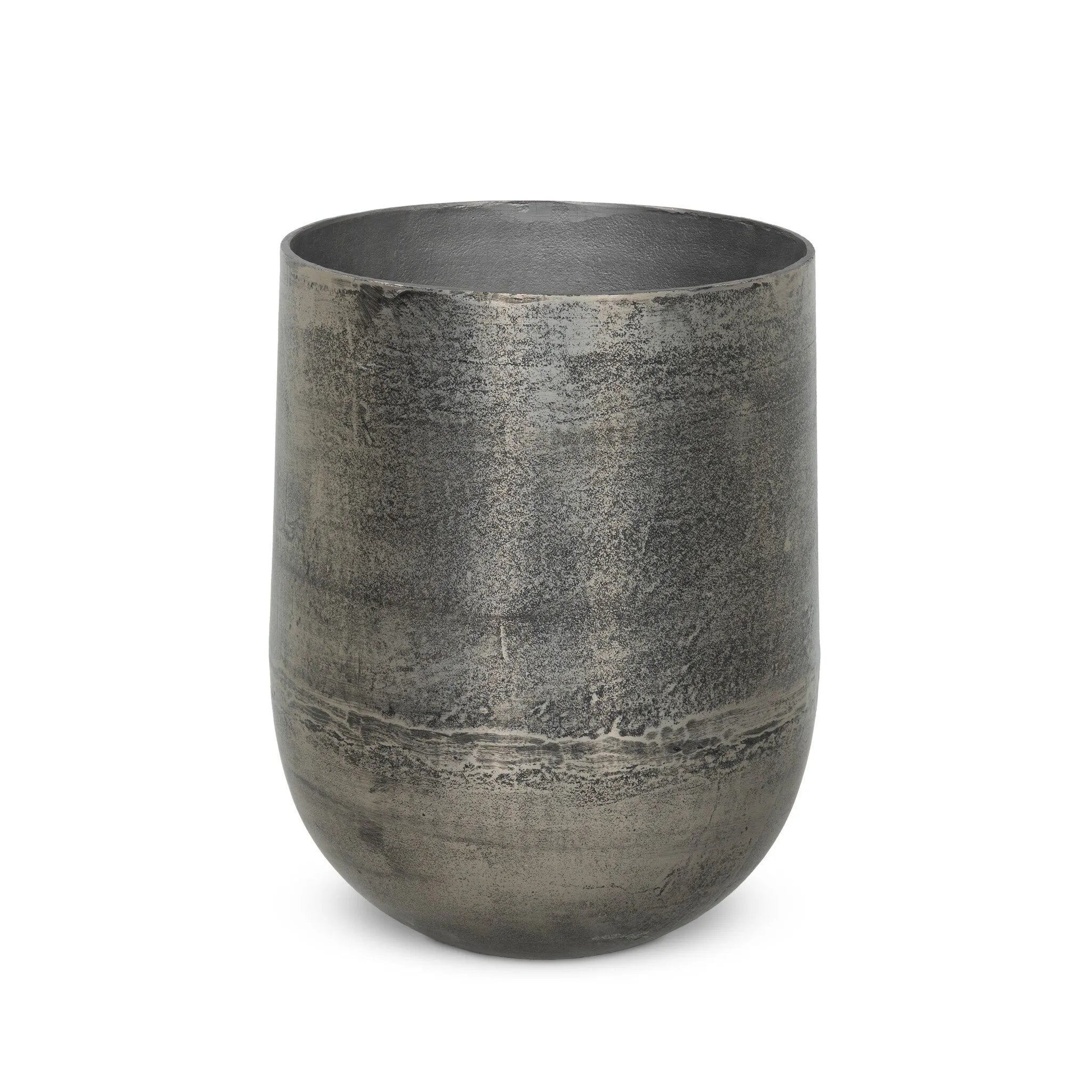 Futuristic-like metal with an antiqued finish, shaped into a cast planter with textural movement that catches the light. Safe for any space, indoor or out. Cover or store indoors during inclement weather and when not in use.As enthusiasts of natural style at Amethyst, we love the designer inspired Zavia Metal Planter - Raw Antique Nickel. Amethyst Home provides interior design, new home construction design consulting, vintage area rugs, and lighting in the Winter Garden metro area.