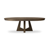 Sculptural angles define this expansive oak dining table, as angled cutouts play up a tapered base and top. Expandable design includes two leaves, easily extending from 77" to 94", for intimate gatherings and dinner parties alike Amethyst Home provides interior design, new home construction design consulting, vintage area rugs, and lighting in the Alpharetta metro area.
