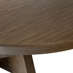 Sculptural angles define this expansive oak dining table, as angled cutouts play up a tapered base and top. Expandable design includes two leaves, easily extending from 77" to 94", for intimate gatherings and dinner parties alike Amethyst Home provides interior design, new home construction design consulting, vintage area rugs, and lighting in the Des Moines metro area.