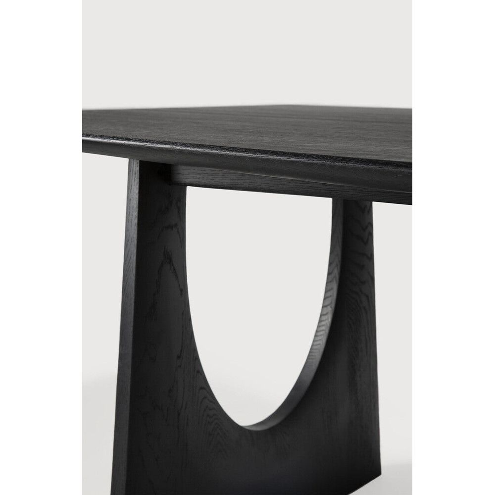 Featuring Geometric Oak Black Rectangular Dining Table by Ethnicraft at Amethyst Home. With enriched shapes and unexpected details, the Geometric solid oak dining table is a statement item, equally at home in the dining room or workspace. Luxury comes with its length, which is offset by softened edges and natural lines. Interesting shapes are in play to add volume and practical . Amethyst Home provides interior design, new construction, custom furniture, and area rugs in the Kansas City metro area