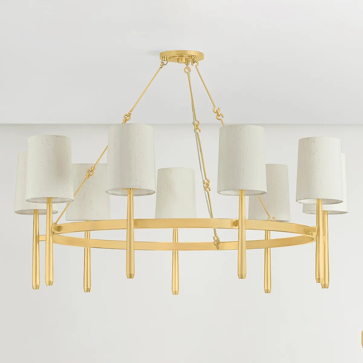 Combining soft materiality and refined form language, the Bridgeton family blends into both modern and classic interiors. Natural silk shades add depth and richness by adding texture to the framework. While the sconce is minimal and timeless, the two sizes of chandelier feature a unique twist on a ring silhouette. Amethyst Home provides interior design, new home construction design consulting, vintage area rugs, and lighting in the Omaha metro area.