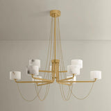 Playing with the concept of jewelry as installation, Bunda mixes structure and fluidity to create eye-catching drama. Finished in Vintage Brass, delicate rope chains dangle and loop across the streamlined arms of this 3- or 9-light chandelier. Amethyst Home provides interior design, new home construction design consulting, vintage area rugs, and lighting in the Calabasas metro area.