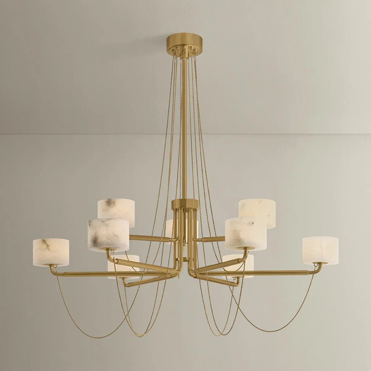 Playing with the concept of jewelry as installation, Bunda mixes structure and fluidity to create eye-catching drama. Finished in Vintage Brass, delicate rope chains dangle and loop across the streamlined arms of this 3- or 9-light chandelier. Amethyst Home provides interior design, new home construction design consulting, vintage area rugs, and lighting in the Portland metro area.