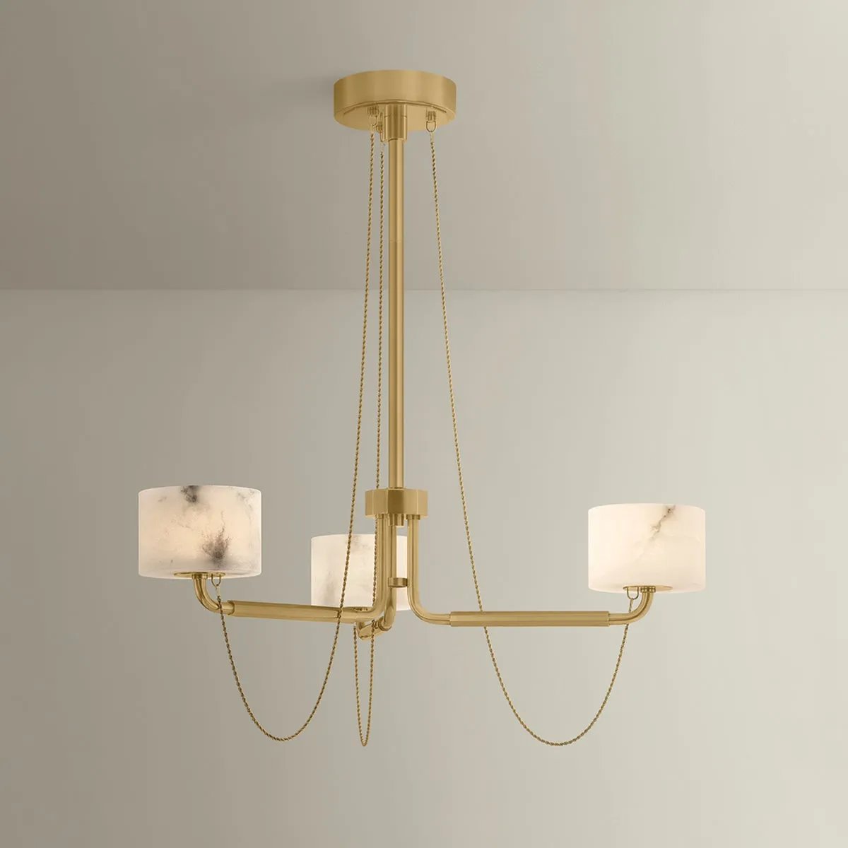 Playing with the concept of jewelry as installation, Bunda mixes structure and fluidity to create eye-catching drama. Finished in Vintage Brass, delicate rope chains dangle and loop across the streamlined arms of this 3- or 9-light chandelier. Amethyst Home provides interior design, new home construction design consulting, vintage area rugs, and lighting in the Seattle metro area.