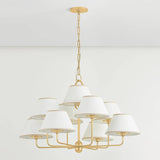 A vintage-inspired silhouette is elevated through thoughtful details in this transitional family. Arranged at varying heights, the overscale white linen tapered shades create a voluminous effect, like a sail billowing in the wind. Ivory trim provides subtle visual interest while remaining fresh and neutral. Amethyst Home provides interior design, new home construction design consulting, vintage area rugs, and lighting in the Houston metro area.