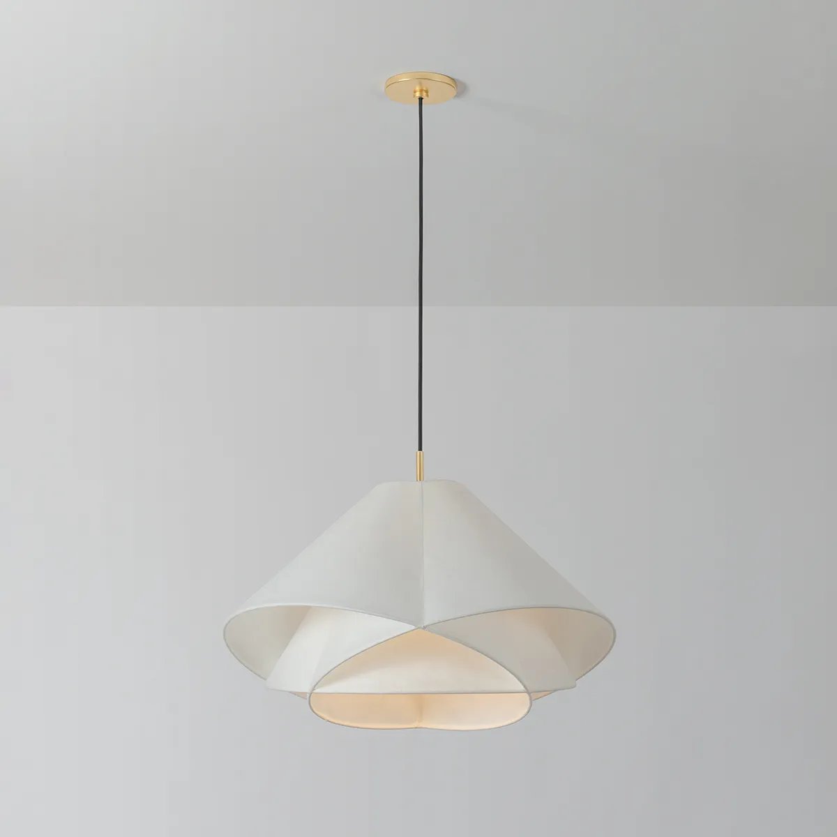 The dynamically layered design of the Edna pendant seeks to push the boundaries of what is possible with a handmade paper shade construction. Constructed as one piece, the shade is comprised of three identical pieces that intersect one another in a perfect geometric array. Amethyst Home provides interior design, new home construction design consulting, vintage area rugs, and lighting in the Miami metro area.