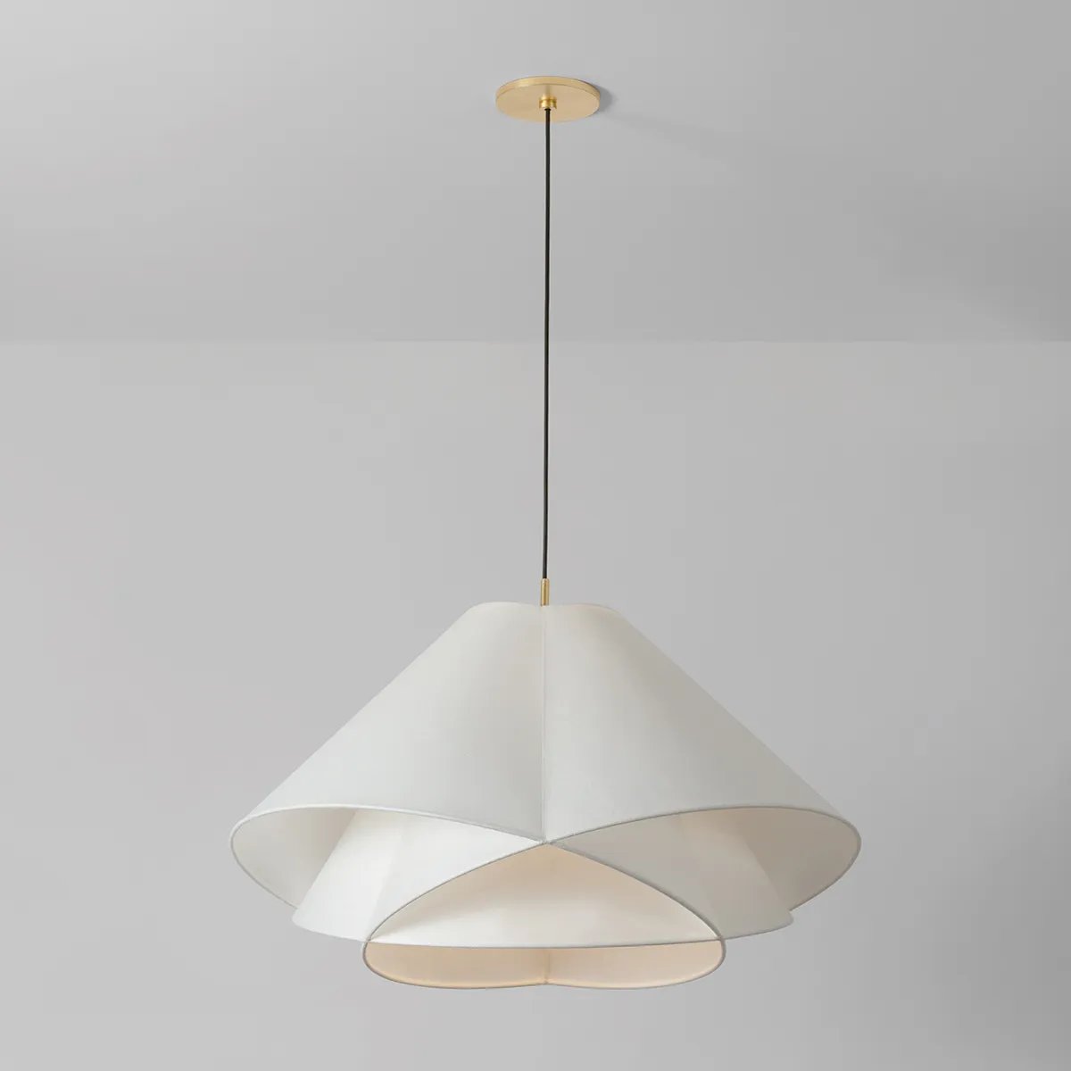 The dynamically layered design of the Edna pendant seeks to push the boundaries of what is possible with a handmade paper shade construction. Constructed as one piece, the shade is comprised of three identical pieces that intersect one another in a perfect geometric array. Amethyst Home provides interior design, new home construction design consulting, vintage area rugs, and lighting in the Newport Beach metro area.