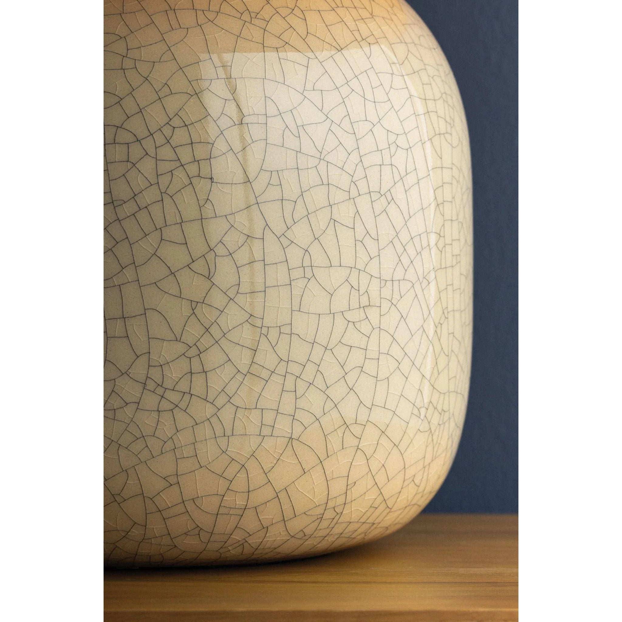 The Leetown lamp reimagines an iconic mushroom silhouette with playful proportions and a highly textured finish. Putting a modern spin on a traditional crackle glaze, ink is applied between the fractured plates to create a striking, graphic effect. Amethyst Home provides interior design, new home construction design consulting, vintage area rugs, and lighting in the Kansas City metro area.