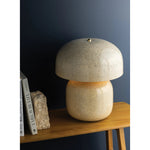 The Leetown lamp reimagines an iconic mushroom silhouette with playful proportions and a highly textured finish. Putting a modern spin on a traditional crackle glaze, ink is applied between the fractured plates to create a striking, graphic effect. Amethyst Home provides interior design, new home construction design consulting, vintage area rugs, and lighting in the Salt Lake City metro area.