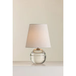 Ridged with ripple-like cuts, the crystal base of the Nicole table lamp makes for an eye-catching accent piece. Topped with a beautiful white linen shade, this pretty portable is rechargeable, adding convenience when styling. With classic Aged Brass-finished hardware, it’s the perfect addition to any bookshelf or small space. Amethyst Home provides interior design, new home construction design consulting, vintage area rugs, and lighting in the Austin metro area.