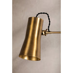 Tailored task lighting, this portable, functional swing arm sconce is also thoughtfully designed and beautiful. The sleek arm features a wooden handle on one end and an adjustable metal shade in Patina Brass or Bronze on the other. The twisted black cord detailing at the shade and backplate give Novel a nostalgic feel. Amethyst Home provides interior design, new home construction design consulting, vintage area rugs, and lighting in the Miami metro area.