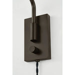 The Yvette plug-in sconce uses a modern lens to reimagine vintage design motifs. The geometry of the metalwork has been simplified to basic lines and curves, with the arc-shaped piece above the shade serving as a handle for adjustments. Finished in creamy Soft Bisque, this design-forward sconce adds plenty of directional light to a desk or bedside. Amethyst Home provides interior design, new home construction design consulting, vintage area rugs, and lighting in the Scottsdale metro area.