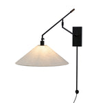 Featuring Hassell Jet Black Sconce by Four Hands at Amethyst Home. A flax linen shade with subtle flecking pairs with a sleek black metal body and dark walnut handle. Dual points of articulation including a horizontal arm rotation and vertical shade adjustment ensure precise light positioning. The plug-in design features a cord-concealing pipe and wall-mounted backplates for a r. Amethyst Home provides interior design, new construction, custom furniture, and area rugs in the Kansas City metro area