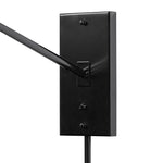 Featuring Hassell Jet Black Sconce by Four Hands at Amethyst Home. A flax linen shade with subtle flecking pairs with a sleek black metal body and dark walnut handle. Dual points of articulation including a horizontal arm rotation and vertical shade adjustment ensure precise light positioning. The plug-in design features a cord-concealing pipe and wall-mounted backplates for a ref. Amethyst Home provides interior design, new construction, custom furniture, and area rugs in the Nashville metro area