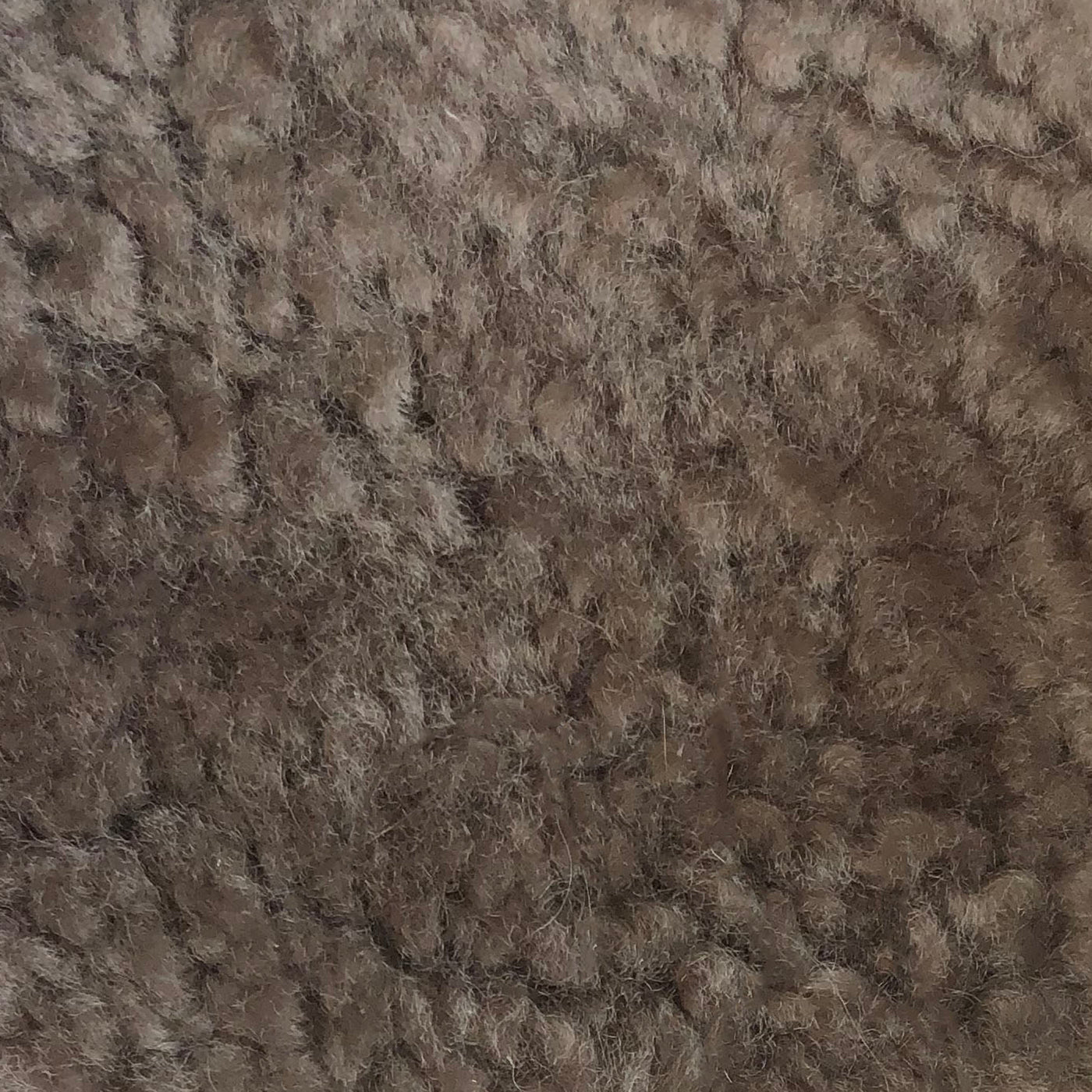 A textural dream made of New Zealand sheepskin in a sophisticated shape. Amethyst Home provides interior design, new home construction design consulting, vintage area rugs, and lighting in the Scottsdale metro area.