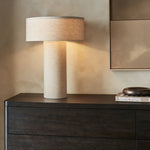 Featuring Hensley Antique Brass Iron Table Lamp by Four Hands at Amethyst Home. Monochrome material. Flax linen covers a classic cylindrical base, topped with a round, low drum-style shade — a modern shape and play on proportions. Brass rotary and finial detail on top break up the all-linen look.Overall Dimensions: 18.00"w x 18.00"d x 24.50"hWeight : 8.16 lbsMaterials : Iron, 75% F. Amethyst Home provides interior design, new construction, custom furniture, and area rugs in the Portland metro area
