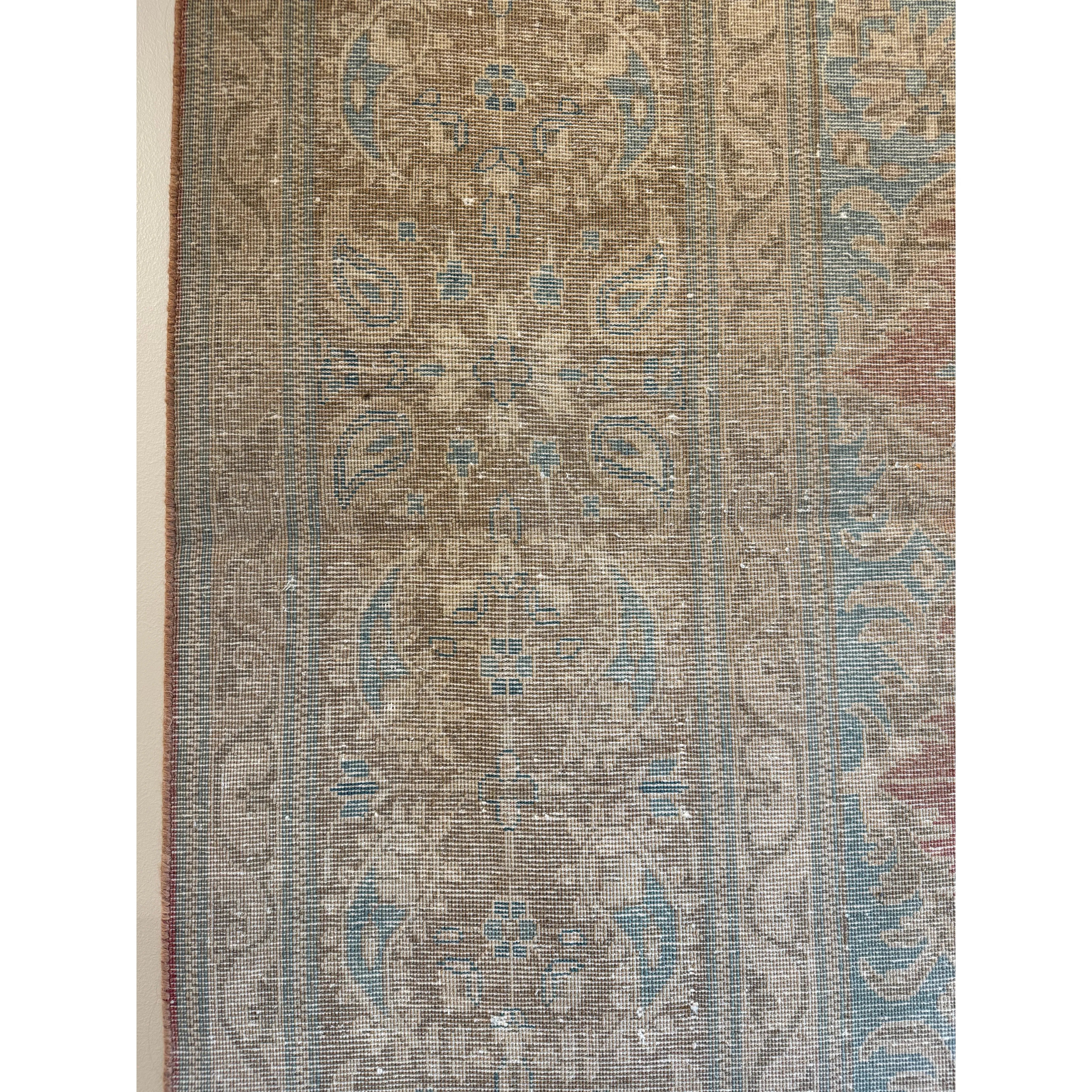 Whitewashed pastels hues on one side, flip for intense pinks and blues!  Hand knotted, 100% wool - perfect for high traffic areas.