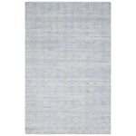 Made from 100% PET the indoor/ outdoor handwoven Roan Aaren is perfect for performance needs.  This pseudo-solid blue rug bodes a light checkered appearance with a neutral backdrop.ROA0 Amethyst Home provides interior design, new home construction design consulting, vintage area rugs, and lighting in the Monterey metro area.