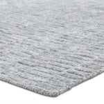 Made from 100% PET the indoor/ outdoor handwoven Roan Aaren is perfect for performance needs.  This pseudo-solid blue rug bodes a light checkered appearance with a neutral backdrop.ROA0 Amethyst Home provides interior design, new home construction design consulting, vintage area rugs, and lighting in the Newport Beach metro area.