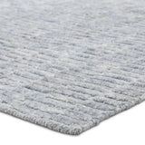 Made from 100% PET the indoor/ outdoor handwoven Roan Aaren is perfect for performance needs.  This pseudo-solid blue rug bodes a light checkered appearance with a neutral backdrop.ROA0 Amethyst Home provides interior design, new home construction design consulting, vintage area rugs, and lighting in the Newport Beach metro area.