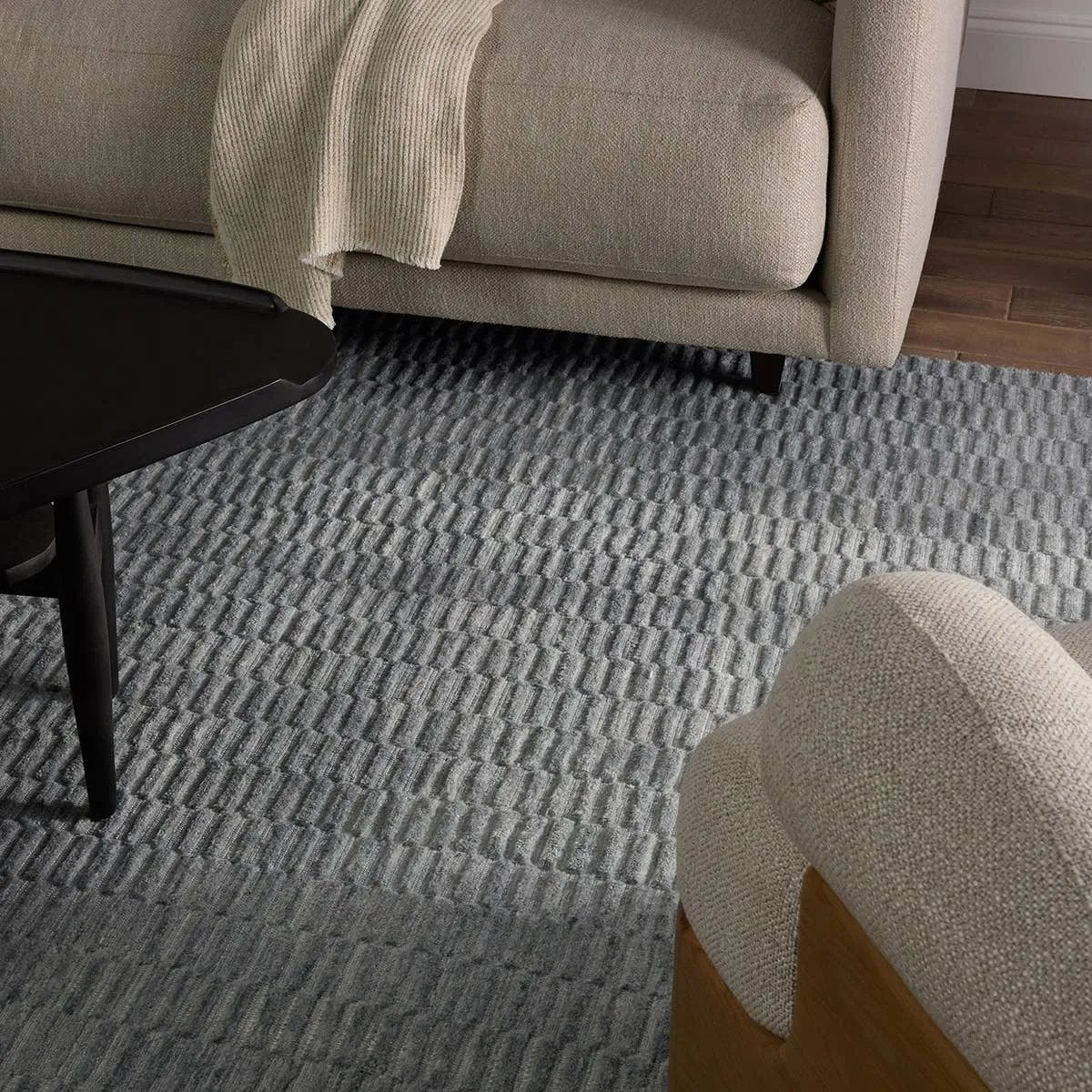 Made from 100% PET the indoor/ outdoor handwoven Roan Aaren is perfect for performance needs.  This pseudo-solid blue rug bodes a light checkered appearance with a neutral backdrop.ROA0 Amethyst Home provides interior design, new home construction design consulting, vintage area rugs, and lighting in the Scottsdale metro area.