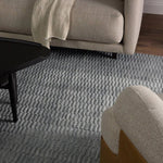 Made from 100% PET the indoor/ outdoor handwoven Roan Aaren is perfect for performance needs.  This pseudo-solid blue rug bodes a light checkered appearance with a neutral backdrop.ROA0 Amethyst Home provides interior design, new home construction design consulting, vintage area rugs, and lighting in the Scottsdale metro area.