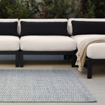 Made from 100% PET the indoor/ outdoor handwoven Roan Aaren is perfect for performance needs.  This pseudo-solid blue rug bodes a light checkered appearance with a neutral backdrop.ROA0 Amethyst Home provides interior design, new home construction design consulting, vintage area rugs, and lighting in the Tampa metro area.