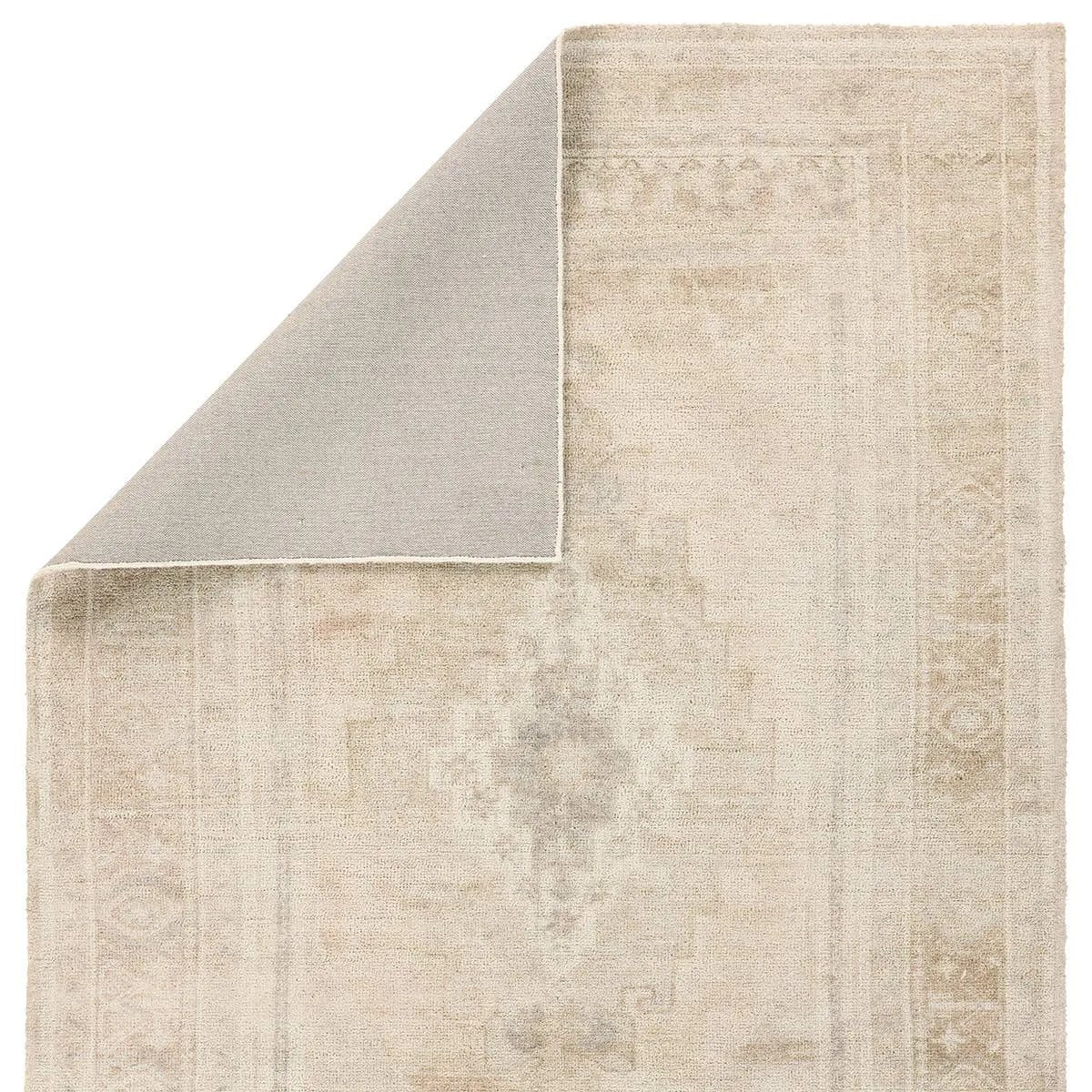 The Adorn design features a traditional medallion motif, set against a warm tan and beige backdrop with subtle accents. Its vintage, distressed look adds character and charm, making it feel like a cherished heirloom from the very first step.Hand Tufte Amethyst Home provides interior design, new home construction design consulting, vintage area rugs, and lighting in the Omaha metro area.