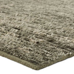 Drawing inspiration from Moroccan textiles, Alpine showcases the beauty in simplicity. Durable wool is hand-knotted onto a cotton foundation to create this high-piled accent piece. Its solid green design instantly adds warmth and comfort to any indoor, medium-traffic setting.Hand Knotte Amethyst Home provides interior design, new home construction design consulting, vintage area rugs, and lighting in the Des Moines metro area.