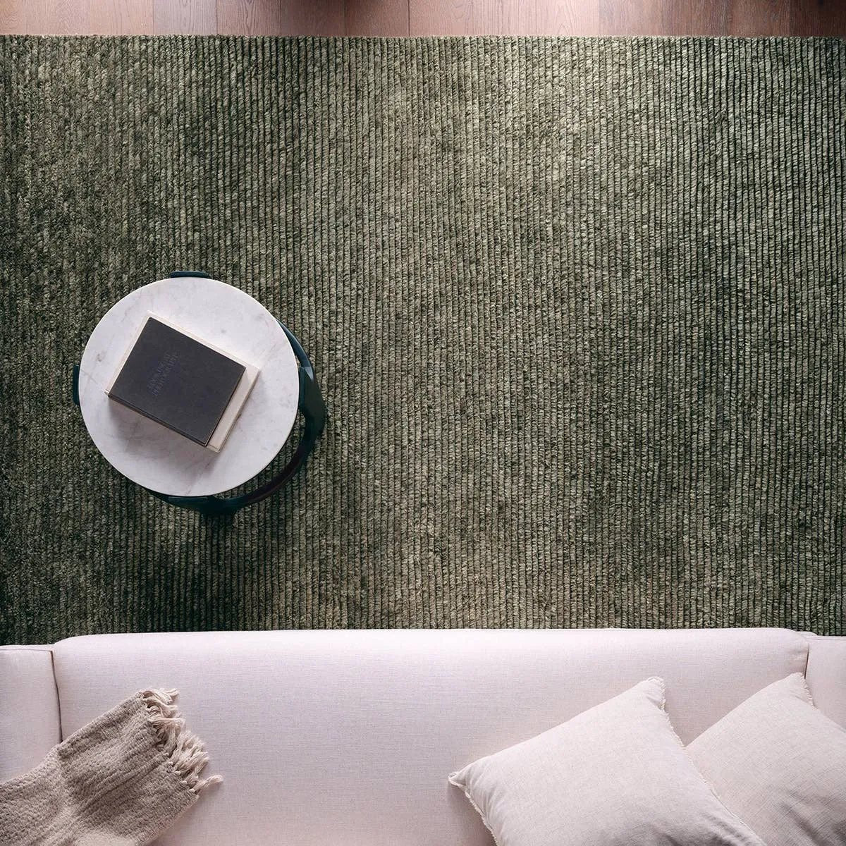 Drawing inspiration from Moroccan textiles, Alpine showcases the beauty in simplicity. Durable wool is hand-knotted onto a cotton foundation to create this high-piled accent piece. Its solid green design instantly adds warmth and comfort to any indoor, medium-traffic setting.Hand Knotte Amethyst Home provides interior design, new home construction design consulting, vintage area rugs, and lighting in the Houston metro area.