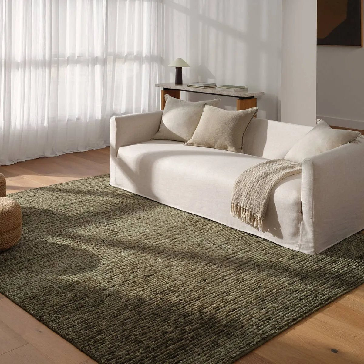 Drawing inspiration from Moroccan textiles, Alpine showcases the beauty in simplicity. Durable wool is hand-knotted onto a cotton foundation to create this high-piled accent piece. Its solid green design instantly adds warmth and comfort to any indoor, medium-traffic setting.Hand Knotte Amethyst Home provides interior design, new home construction design consulting, vintage area rugs, and lighting in the Laguna Beach metro area.