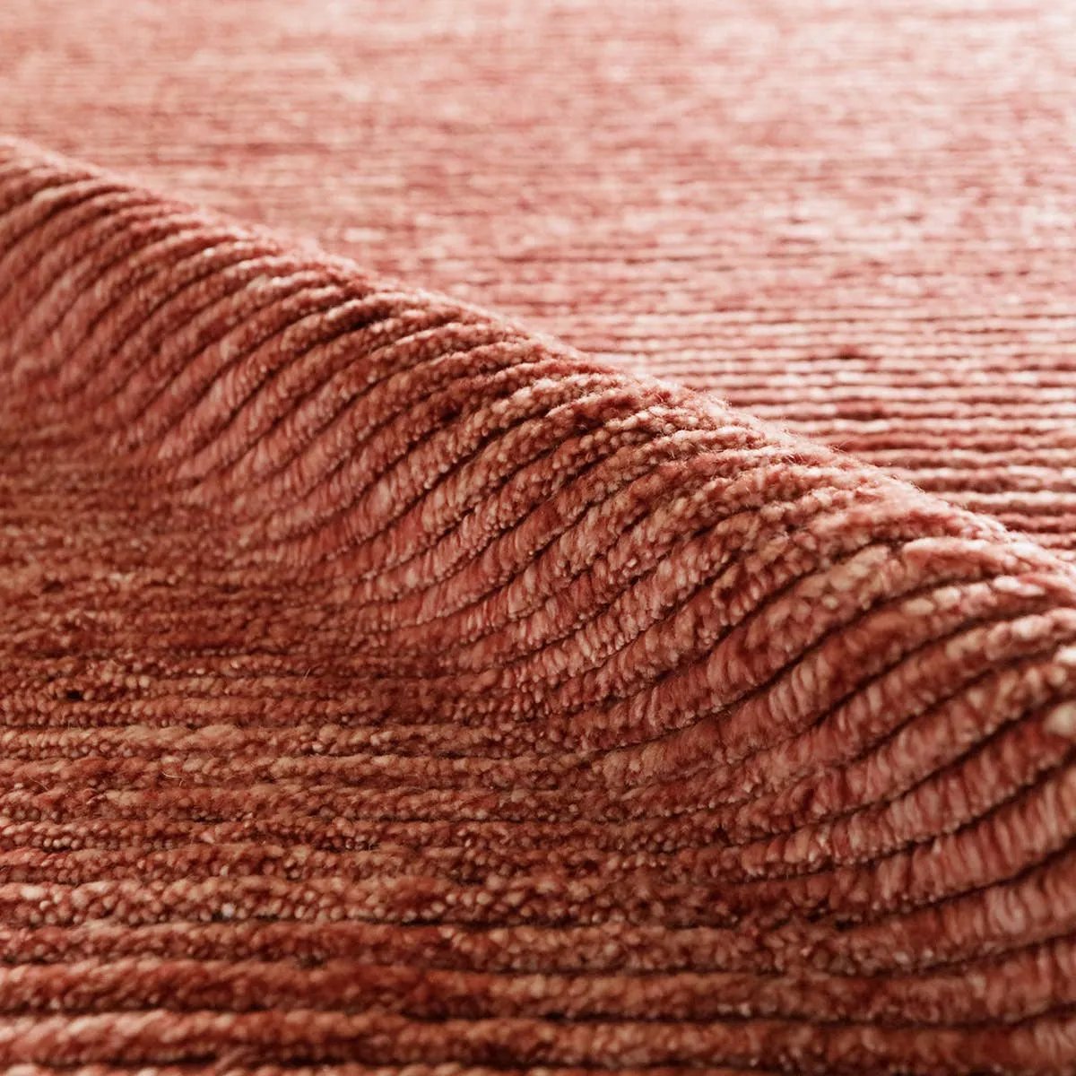 Drawing inspiration from Moroccan textiles, Alpine showcases the beauty in simplicity. Durable wool is hand-knotted onto a cotton foundation to create this high-piled accent piece. Its solid red design instantly adds warmth and comfort to any indoor, medium-traffic setting.Hand Knotte Amethyst Home provides interior design, new home construction design consulting, vintage area rugs, and lighting in the Scottsdale metro area.