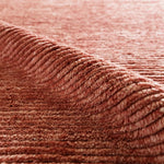 Drawing inspiration from Moroccan textiles, Alpine showcases the beauty in simplicity. Durable wool is hand-knotted onto a cotton foundation to create this high-piled accent piece. Its solid red design instantly adds warmth and comfort to any indoor, medium-traffic setting.Hand Knotte Amethyst Home provides interior design, new home construction design consulting, vintage area rugs, and lighting in the Scottsdale metro area.