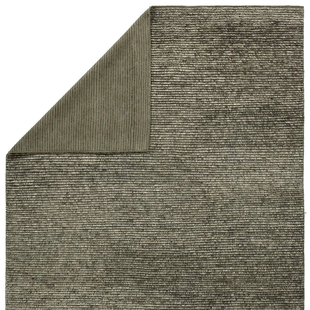 Drawing inspiration from Moroccan textiles, Alpine showcases the beauty in simplicity. Durable wool is hand-knotted onto a cotton foundation to create this high-piled accent piece. Its solid green design instantly adds warmth and comfort to any indoor, medium-traffic setting.Hand Knotte Amethyst Home provides interior design, new home construction design consulting, vintage area rugs, and lighting in the Washington metro area.