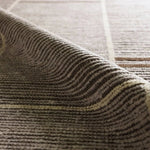 Beauty is on the horizon with the Bezem Aytana. The Aytana design features a mid-century linear pattern for subtle visual depth. Hand-knotted from easy-care wool with a high-low pile, this piece is as practical as it is captivating—a true testament to modern craftsmanship.Hand Knotte Amethyst Home provides interior design, new home construction design consulting, vintage area rugs, and lighting in the Houston metro area.