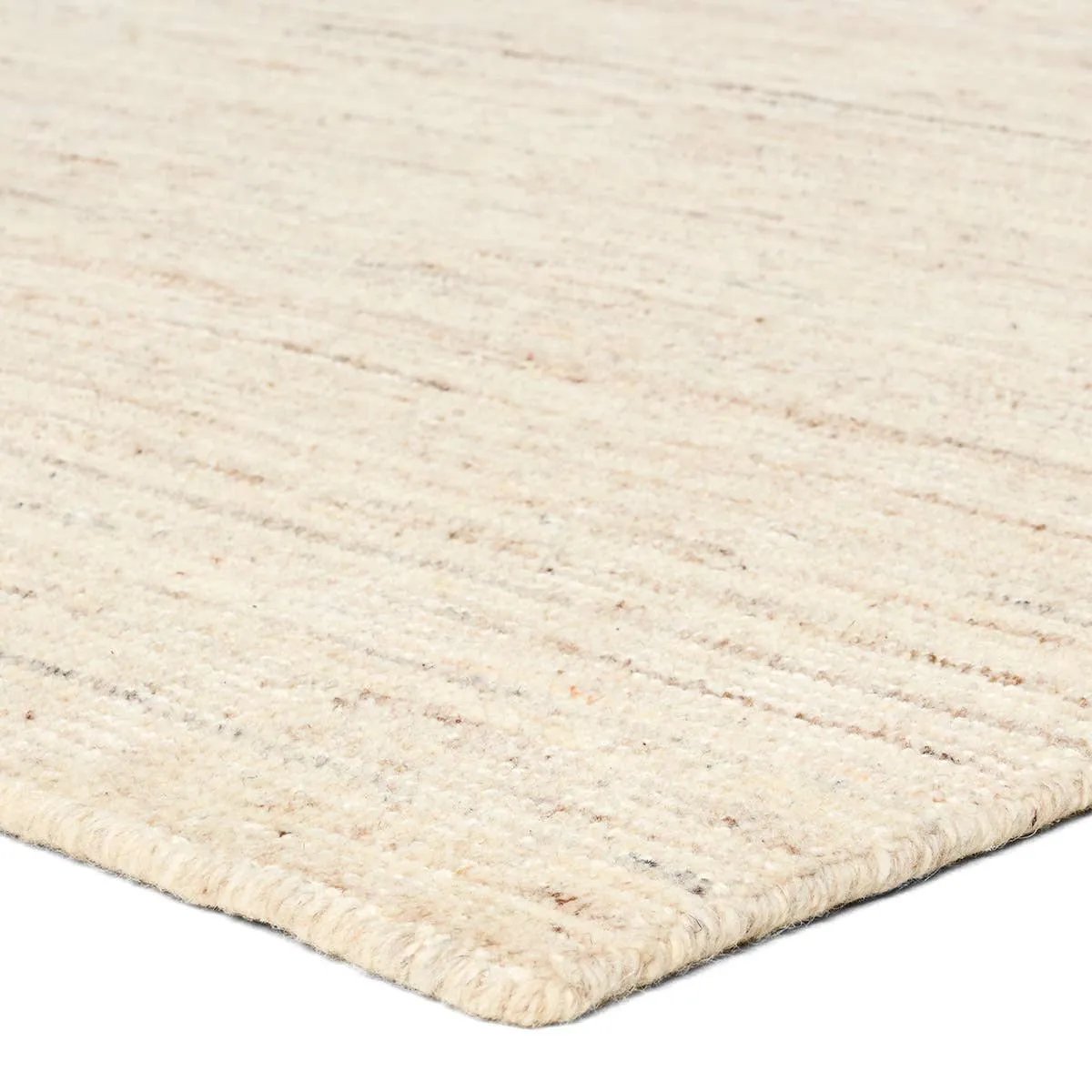 Subtle variations of white and beige create depth and dimension in the elegantly understated Hue rug. Handwoven with precision, its solid design offers a timeless foundation for any space—from modern to classic interiors.Handwove Amethyst Home provides interior design, new home construction design consulting, vintage area rugs, and lighting in the Des Moines metro area.