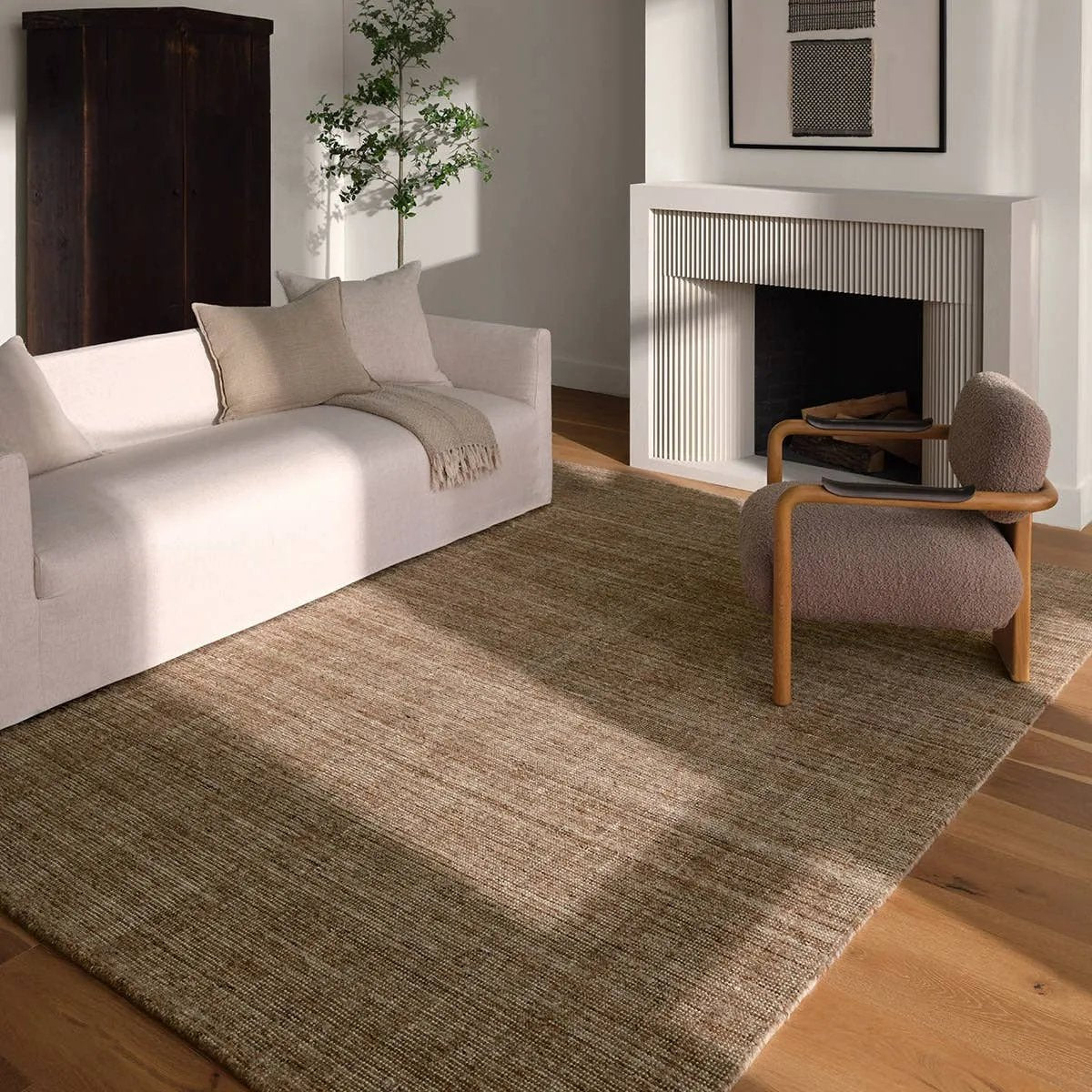Subtle variations of brown create depth and dimension in the elegantly understated Hue rug. Handwoven with precision, its solid design offers a timeless foundation for any space—from modern to classic interiors.Handwove Amethyst Home provides interior design, new home construction design consulting, vintage area rugs, and lighting in the Newport Beach metro area.