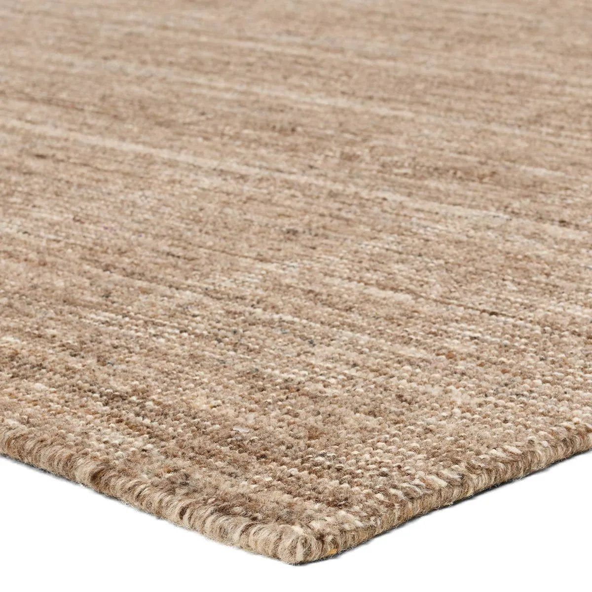 Subtle variations of brown create depth and dimension in the elegantly understated Hue rug. Handwoven with precision, its solid design offers a timeless foundation for any space—from modern to classic interiors.Handwove Amethyst Home provides interior design, new home construction design consulting, vintage area rugs, and lighting in the Washington metro area.