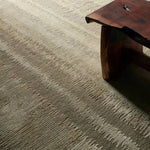 A contemporary interplay of cream and green comes to life in a striking abstract linear design. Crafted from a luxurious blend of viscose and silk, the Jovian design’s luminous sheen accentuates the depth and movement of its pattern. This handknotted piece exudes sophistication and exceptional craftsmanship, making it a stunning foundation.HIB0 Amethyst Home provides interior design, new home construction design consulting, vintage area rugs, and lighting in the Alpharetta metro area.