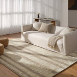 A contemporary interplay of cream and green comes to life in a striking abstract linear design. Crafted from a luxurious blend of viscose and silk, the Jovian design’s luminous sheen accentuates the depth and movement of its pattern. This handknotted piece exudes sophistication and exceptional craftsmanship, making it a stunning foundation.HIB0 Amethyst Home provides interior design, new home construction design consulting, vintage area rugs, and lighting in the Dallas metro area.