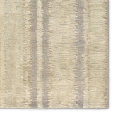 A contemporary interplay of cream and green comes to life in a striking abstract linear design. Crafted from a luxurious blend of viscose and silk, the Jovian design’s luminous sheen accentuates the depth and movement of its pattern. This handknotted piece exudes sophistication and exceptional craftsmanship, making it a stunning foundation.HIB0 Amethyst Home provides interior design, new home construction design consulting, vintage area rugs, and lighting in the Los Angeles metro area.