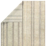A contemporary interplay of cream and green comes to life in a striking abstract linear design. Crafted from a luxurious blend of viscose and silk, the Jovian design’s luminous sheen accentuates the depth and movement of its pattern. This handknotted piece exudes sophistication and exceptional craftsmanship, making it a stunning foundation.HIB0 Amethyst Home provides interior design, new home construction design consulting, vintage area rugs, and lighting in the Omaha metro area.