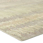 A contemporary interplay of cream and green comes to life in a striking abstract linear design. Crafted from a luxurious blend of viscose and silk, the Jovian design’s luminous sheen accentuates the depth and movement of its pattern. This handknotted piece exudes sophistication and exceptional craftsmanship, making it a stunning foundation.HIB0 Amethyst Home provides interior design, new home construction design consulting, vintage area rugs, and lighting in the Scottsdale metro area.