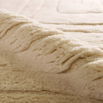 Embrace clean, simple elegance with the Ameln Kenji. As artisans knot each strand by hand, they weave in modern, centric lines that balance Moroccan heritage with contemporary edge. Made from lush New Zealand wool, the Kenji rug offers delicious dimension and a cloud-like texture, offering comfort with every step.Hand Knotte Amethyst Home provides interior design, new home construction design consulting, vintage area rugs, and lighting in the Nashville metro area.