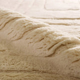 Embrace clean, simple elegance with the Ameln Kenji. As artisans knot each strand by hand, they weave in modern, centric lines that balance Moroccan heritage with contemporary edge. Made from lush New Zealand wool, the Kenji rug offers delicious dimension and a cloud-like texture, offering comfort with every step.Hand Knotte Amethyst Home provides interior design, new home construction design consulting, vintage area rugs, and lighting in the Nashville metro area.