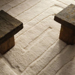 Embrace clean, simple elegance with the Ameln Kenji. As artisans knot each strand by hand, they weave in modern, centric lines that balance Moroccan heritage with contemporary edge. Made from lush New Zealand wool, the Kenji rug offers delicious dimension and a cloud-like texture, offering comfort with every step.Hand Knotte Amethyst Home provides interior design, new home construction design consulting, vintage area rugs, and lighting in the Tampa metro area.