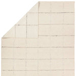 Featuring Leona Coart Rug by Jaipur Living at Amethyst Home. With its lofty, handmade loops, the Coart rug is an inviting, textural essential. Crafted of 100% undyed wool, its natural, relaxed, persona is met with a crisp, contemporary grid pattern.  An outstanding union of artistry and contemporary style, its physical approachability, monochromatic palette, . Amethyst Home provides interior design, new home construction design consulting, vintage area rugs, and lighting in the Houston metro area.