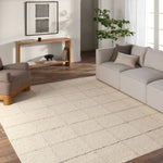 Featuring Leona Coart Rug by Jaipur Living at Amethyst Home. With its lofty, handmade loops, the Coart rug is an inviting, textural essential. Crafted of 100% undyed wool, its natural, relaxed, persona is met with a crisp, contemporary grid pattern.  An outstanding union of artistry and contemporary style, its physical approachability, monochromatic pale. Amethyst Home provides interior design, new home construction design consulting, vintage area rugs, and lighting in the Laguna Beach metro area.